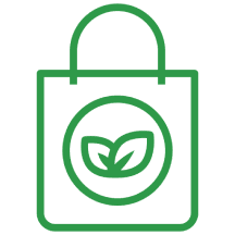 Green outline icon of a reusable shopping bag with a circular emblem featuring two leaves in the center, symbolizing eco-friendly or sustainable shopping.