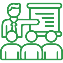 Outline icon of a person in a tie presenting information to three seated people in front of a flip chart or whiteboard.